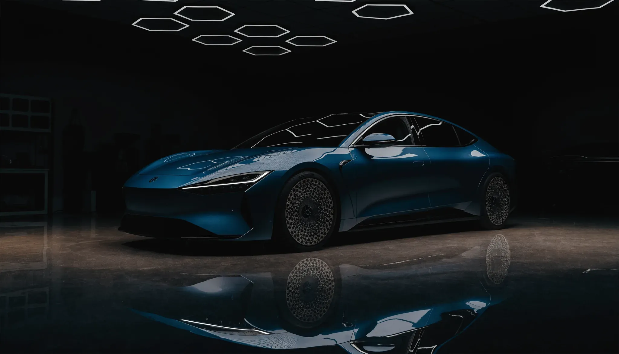A midnight-blue electric sedan with a mirror-gloss finish under studio lighting at JD Mobile Auto Detailing, Abbotsford